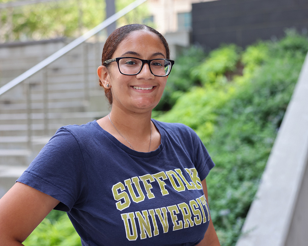 Photo of Ram Supporter standing in Roemer Plaza on campus at Suffolk University.
