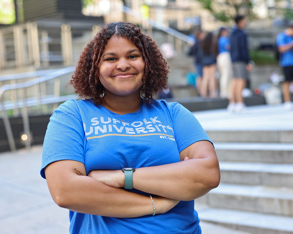 Photo of Ram Supporter standing in Roemer Plaza on campus at Suffolk University.