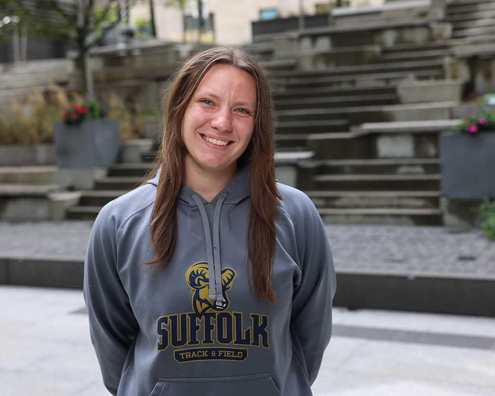 Photo of Ram Supporter standing in Roemer Plaza on campus at Suffolk University.