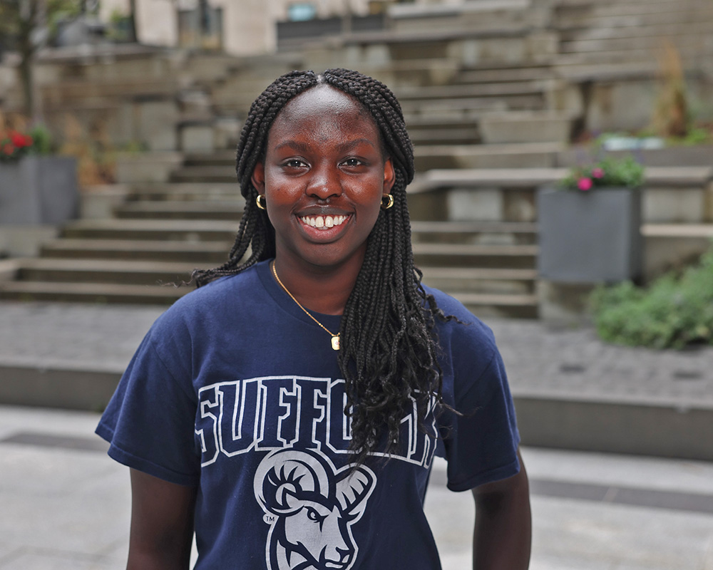 Photo of Ram Supporter standing in Roemer Plaza on campus at Suffolk University.