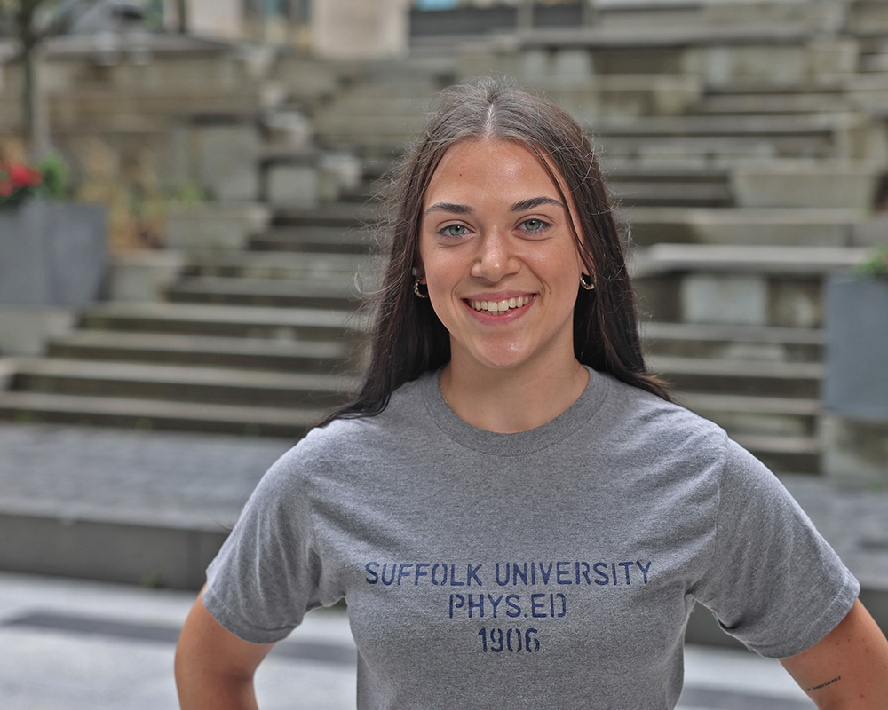 Photo of Ram Supporter standing in Roemer Plaza on campus at Suffolk University.