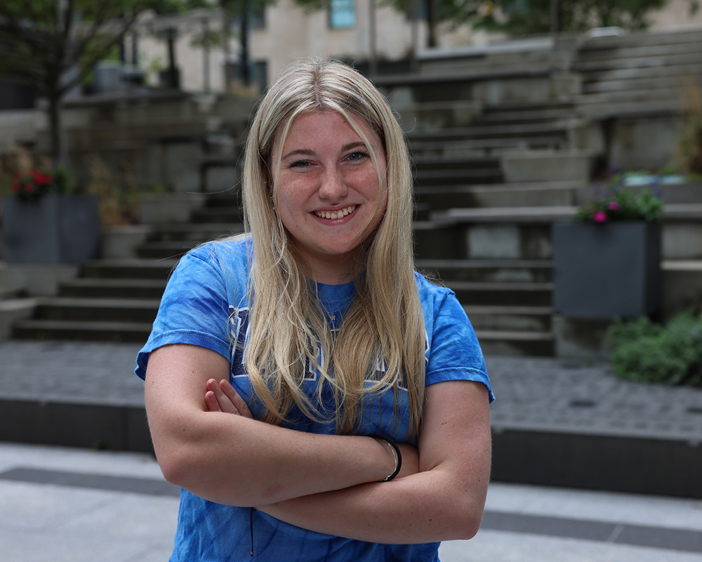 Photo of Ram Supporter standing in Roemer Plaza on campus at Suffolk University.