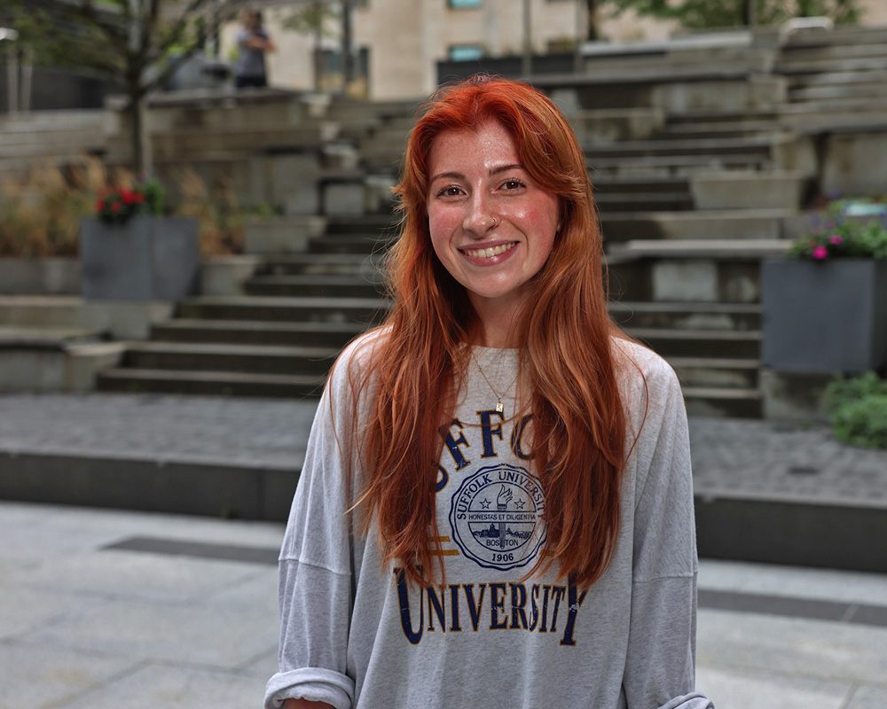 Photo of Ram Supporter standing in Roemer Plaza on campus at Suffolk University.