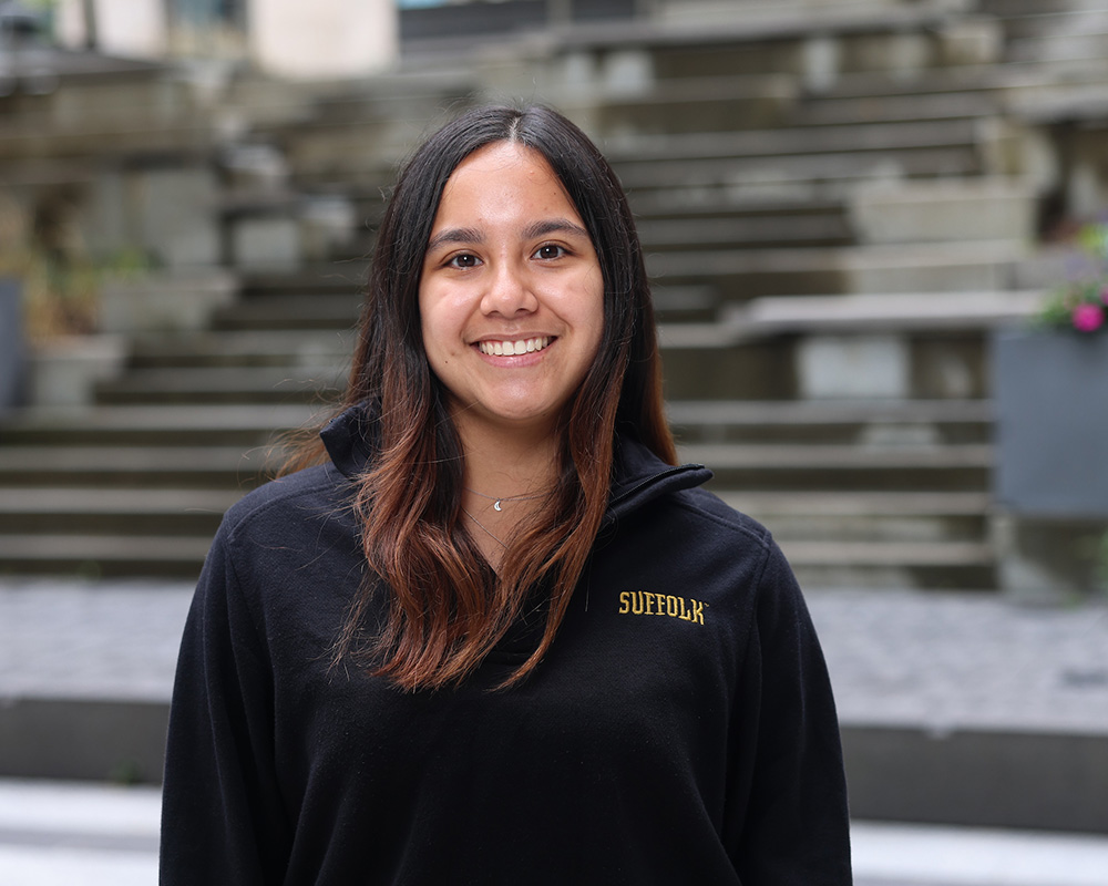 Photo of Ram Supporter standing in Roemer Plaza on campus at Suffolk University.
