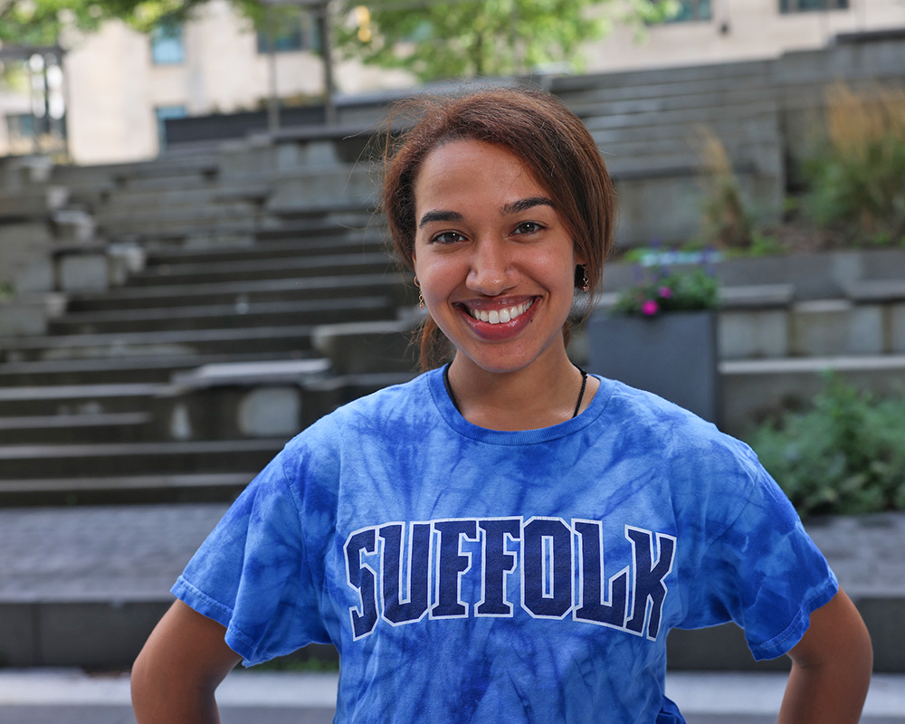 Photo of Ram Supporter standing in Roemer Plaza on campus at Suffolk University.