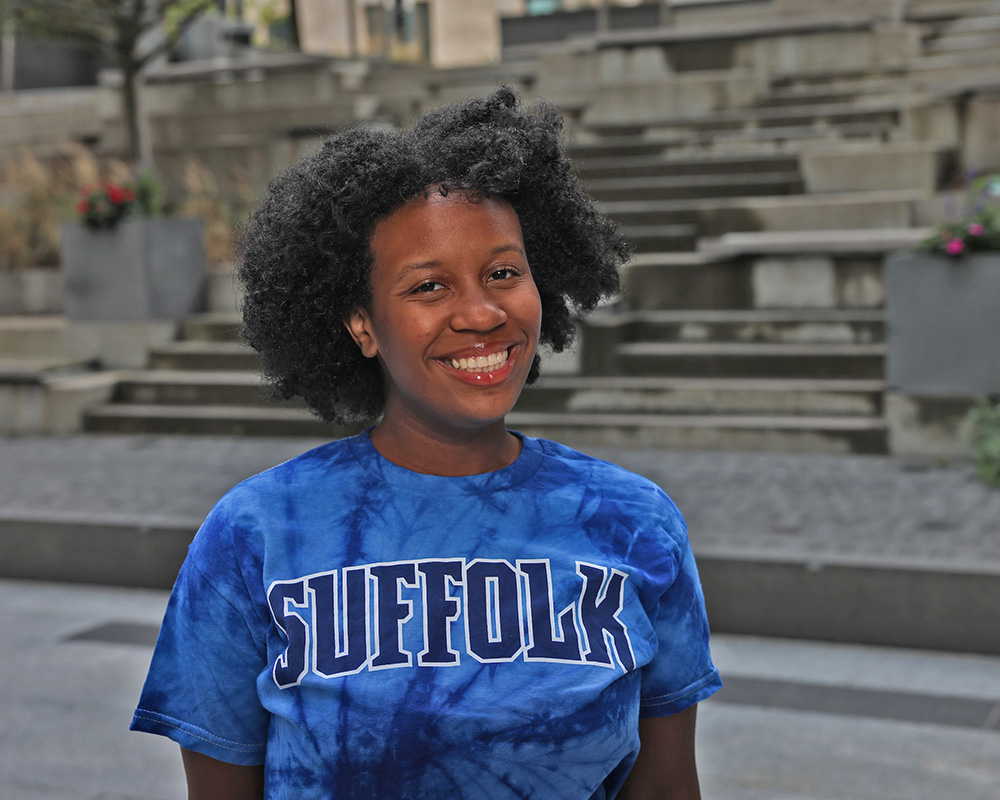 Photo of Ram Supporter standing in Roemer Plaza on campus at Suffolk University.