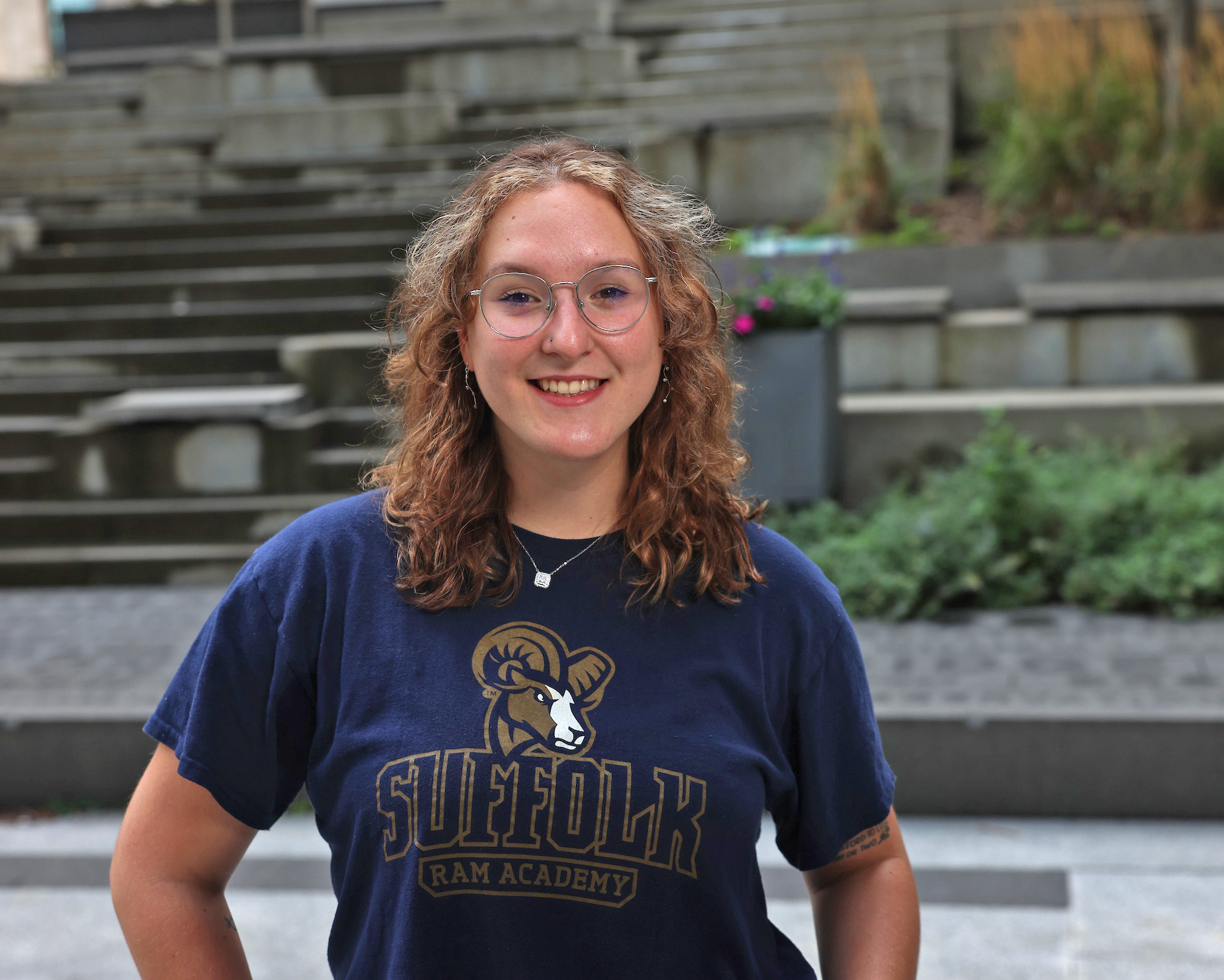 Photo of Ram Supporter standing in Roemer Plaza on campus at Suffolk University.