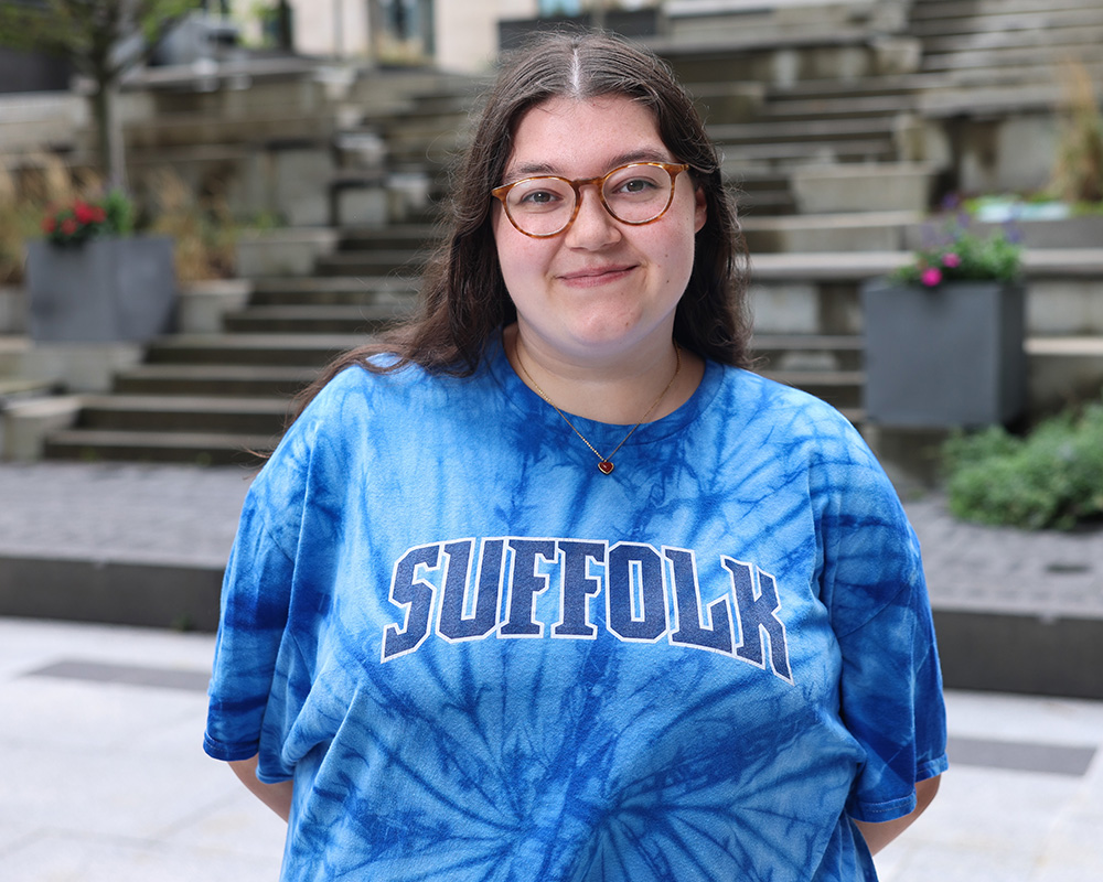 Photo of Ram Supporter standing in Roemer Plaza on campus at Suffolk University.