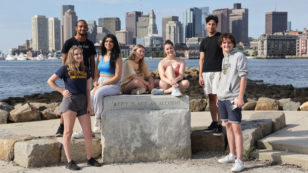 Suffolk students gathered for a picture on the East Boston waterfront.